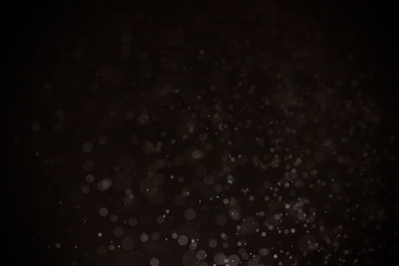 Abstract black  bokeh with black backgroundの写真素材