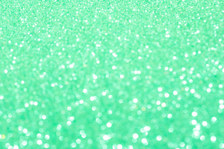 Bright glowing green bokeh natural background