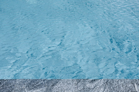 abstract blue color water wave in swimming pool pure natural swirl pattern texture use for backgroundの写真素材