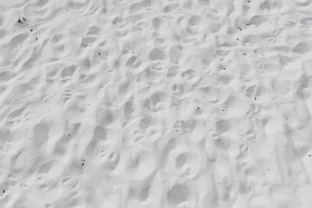 Fine white sand that glistens and reflects the sunlight. use for backgroundの写真素材
