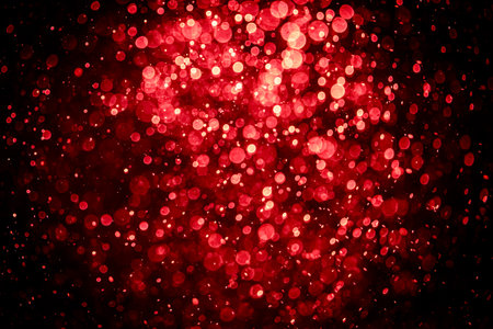Blurred photo with red dots visible glittering, shining brightly look and feel luxurious Suitable for use as a wallpaperの写真素材