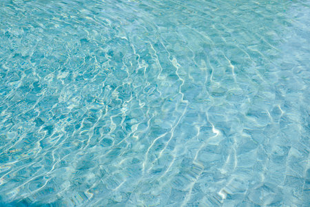 abstract blue color water wave in swimming pool pure natural swirl pattern texture use for backgroundの写真素材