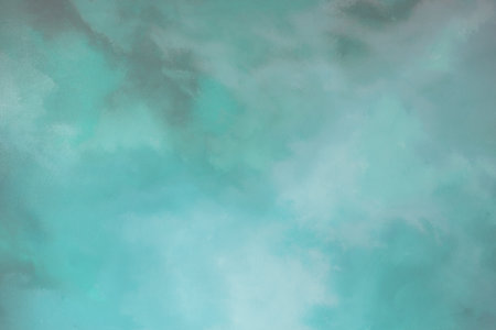 Abstract brush stroke painting featuring a blend of blue, purple, and green hues with a textured appearance.の写真素材