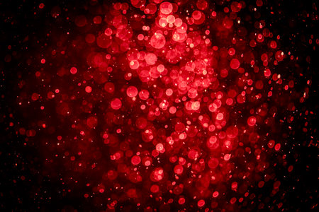 Blurred photo with red dots visible glittering, shining brightly look and feel luxurious Suitable for use as a wallpaperの写真素材
