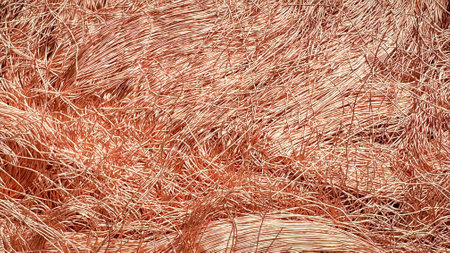 Macro view of tangled copper wire shavings forming a dense mesh.の写真素材