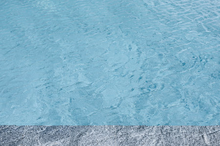 abstract blue color water wave in swimming pool pure natural swirl pattern texture use for backgroundの写真素材