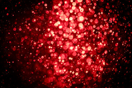 Blurred photo with red dots visible glittering, shining brightly look and feel luxurious Suitable for use as a wallpaperの写真素材
