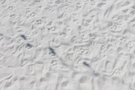 Fine white sand that glistens and reflects the sunlight. use for backgroundの写真素材