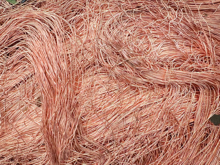 Macro view of tangled copper wire shavings forming a dense mesh.の写真素材