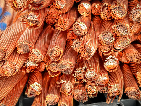 Close-up shot of frayed copper wires displaying strands and oxidation.の写真素材