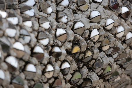 Ceramic pattern on the wall of the building in the parkの写真素材