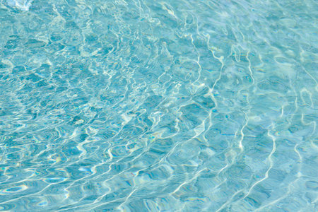 abstract blue color water wave in swimming pool pure natural swirl pattern texture use for backgroundの写真素材