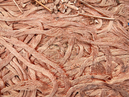 Artistic tangle of copper wires with a chaotic texture.の写真素材