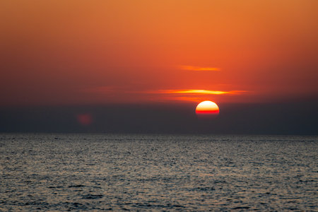 Sunset over the sea. Beautiful sunset over the sea. Beautiful sunset over the sea.の写真素材