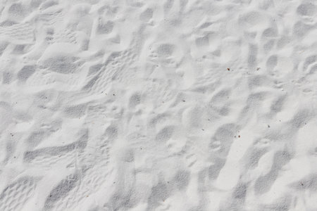 Fine white sand that glistens and reflects the sunlight. use for backgroundの写真素材