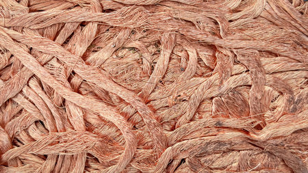 Artistic tangle of copper wires with a chaotic texture.の写真素材