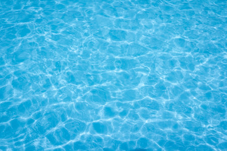The light reflects blue in the water in the swimming pool. It looks fresh and lively, suitable for...