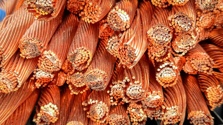 Close-up shot of frayed copper wires displaying strands and oxidation.の写真素材