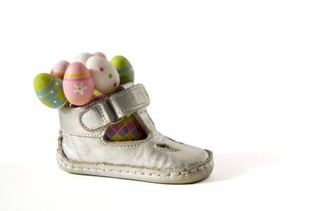 Easter eggs in a children's silver boot