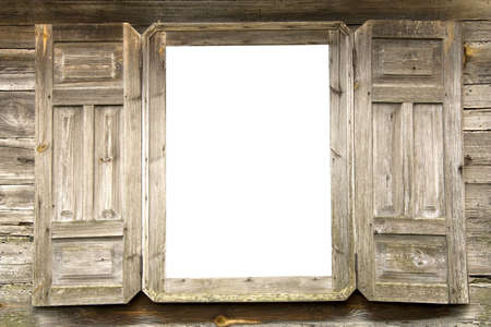 Old wooden open window with white glasses and with the opened shuttersの写真素材