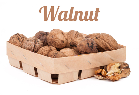 box of walnuts isolated on white backgroundの写真素材