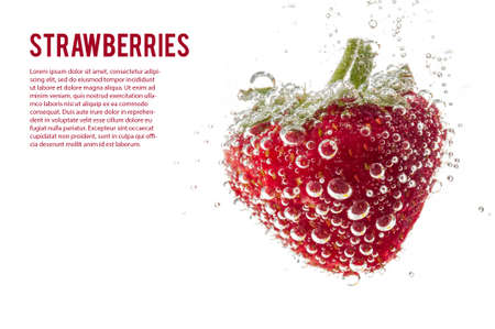 Strawberries in mineral water isolated on white backgroundの写真素材