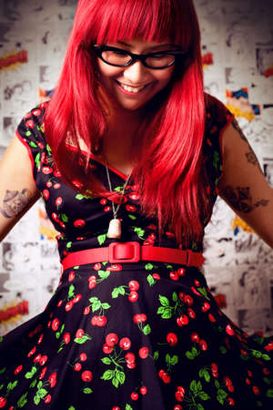 Woman in a cherry dress.の写真素材