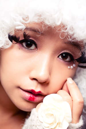 Girl with big eyelash.の写真素材