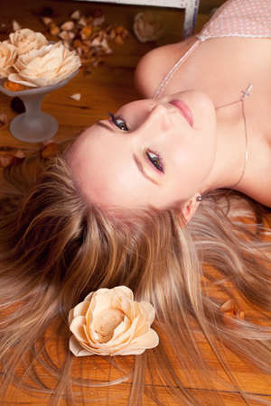 Beautiful young woman relaxed on the floor.の写真素材