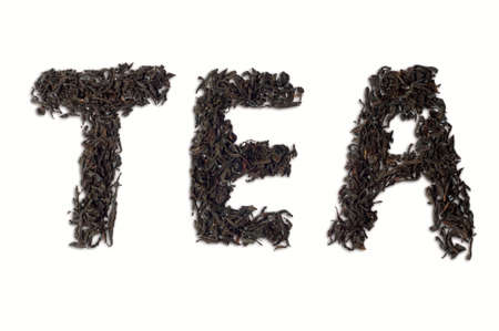 Tea word on a dry tea isolated on the white backgroundの写真素材