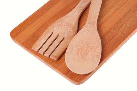 Top view of wooden kitchen utensils on wood boardの写真素材