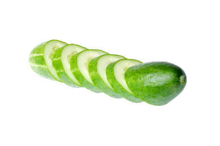 Cucumber and slices isolated over white backgroundの写真素材