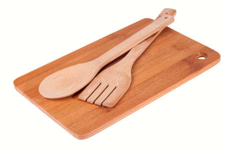 Top view of wooden kitchen utensils on wood boardの写真素材