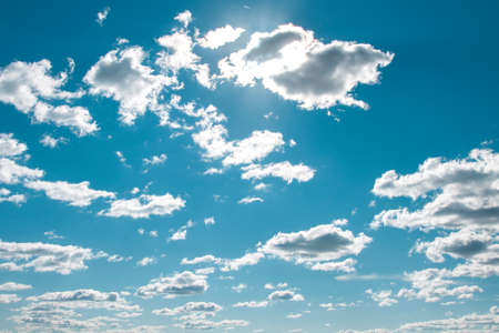 White fluffy clouds in the blue sky