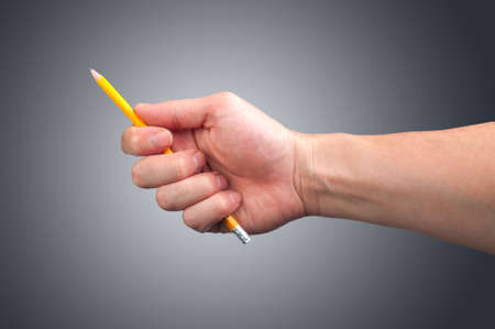 Pencil in hand. Isolatedの写真素材