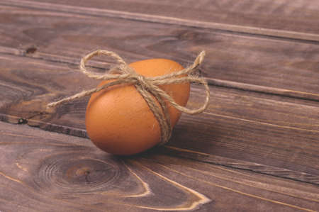 Easter eggs on a dark wooden backgroundの写真素材