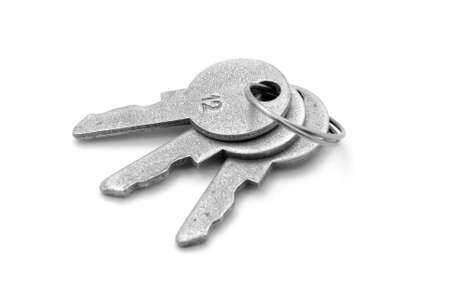 Steel keys on white backgroundの写真素材