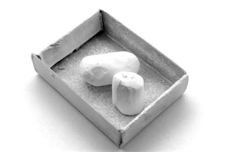 Isolated chalk in box on white backgroundの写真素材