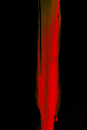 Abstract blood on black backgroundの写真素材