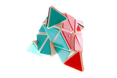 A colorful triangle toy isolated on white