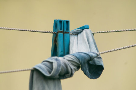 Clothes drying on a clothesline in a summer day closeup