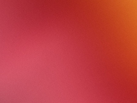 A vibrant gradient of warm colors transitioning from red to orange and yellow