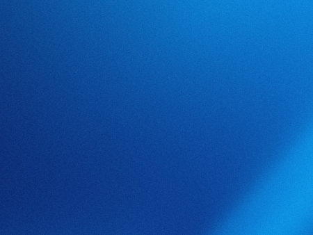 The image showcases a smooth gradient of blue shades, transitioning from a deep, dark blue to a...