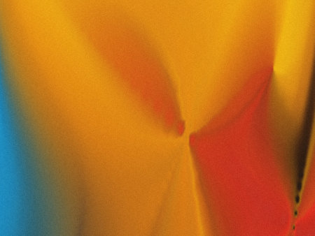 This image showcases a smooth gradient transition between warm colors, primarily featuring shades of...