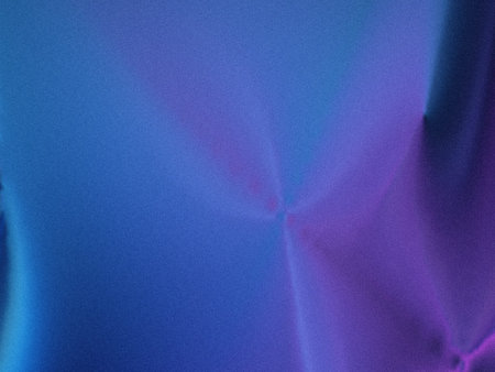 The image shows a close-up view of a textured fabric surface with a smooth gradient transitioning...