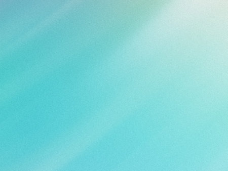 The image displays a smooth gradient transition between a light aqua tone at the bottom and a pale...