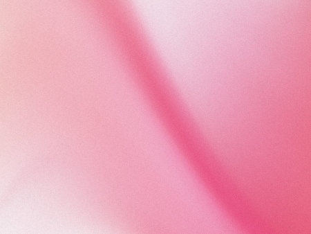 This image showcases a smooth gradient transition of varying shades of pink, ranging from light...