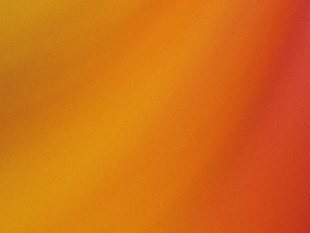 This image showcases a smooth gradient transitioning from a bright, warm orange at the top left to a...