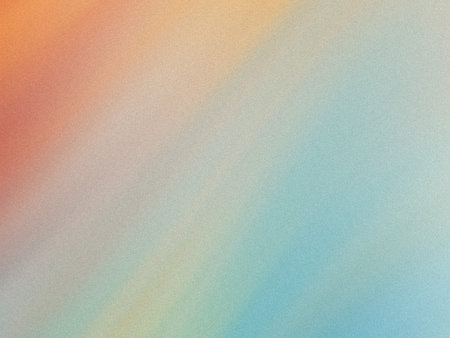 This image showcases a smooth gradient of watercolor splashes transitioning from warm orange hues to...
