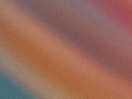 This image showcases a smooth yet textured gradient blending of warm colors ranging from deep reds...